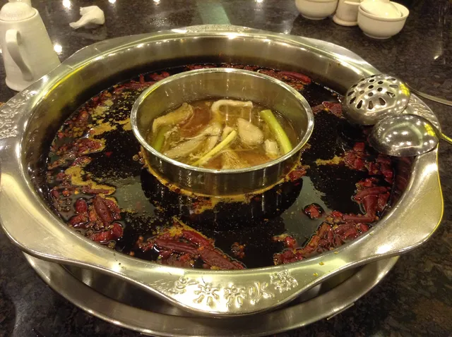 Chongqing Qiqi Hot Pot Head Office