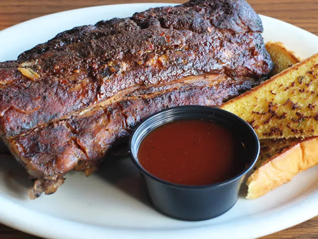 The Pit Stop Sports Bar & BBQ Grill