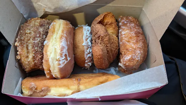 Fosters Donuts "Made & Served By People Who Care"