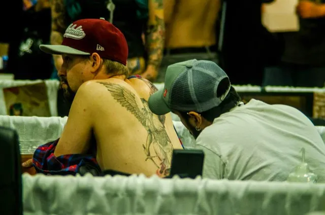 Tattoo Tribe. (English,Spanish & Portuguese)