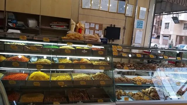 TAJ 53 SWEETS AND SNACKS CO.