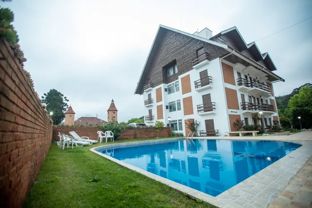 Apto aluguel temporada campos do jordao charmoso aconchegante com vista total para natureza refugio montanhas vila capivari