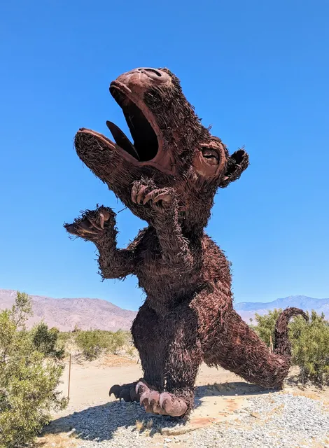 Dying Dinosaur Sculpture