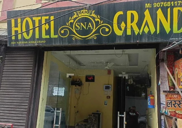 OYO Hotel Sna Grand Near Sudarshan Cinema