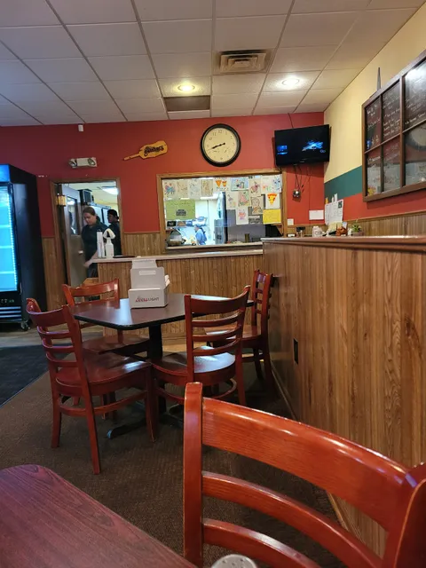 Mel's Sportspage Bar & Snickers Pizza Shop