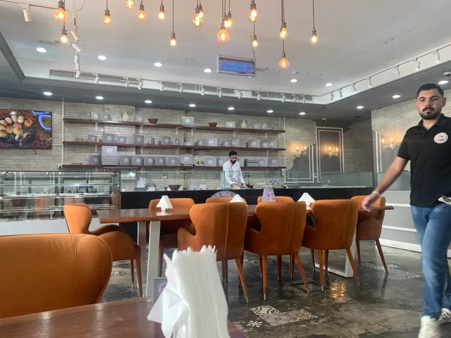 مطعم منسف و كنافة