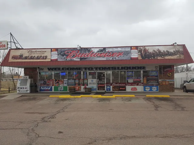 Tom's Liquor And Vape Smoke