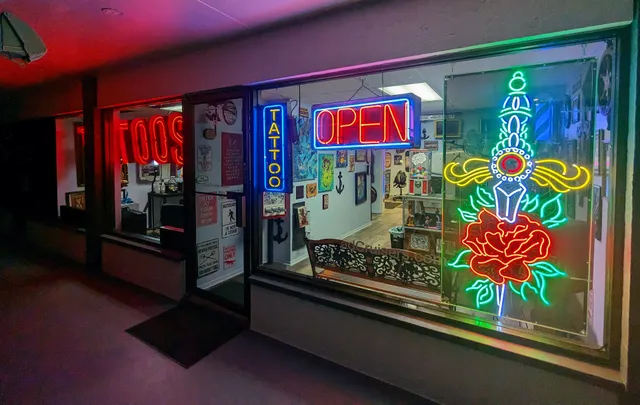 Rose And Dagger Tattoo Studio