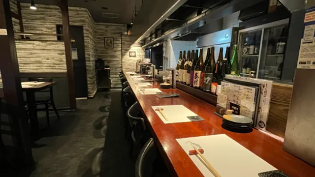 Sake, fresh fish and rice cooked in a pot Taikobo Hoppechi