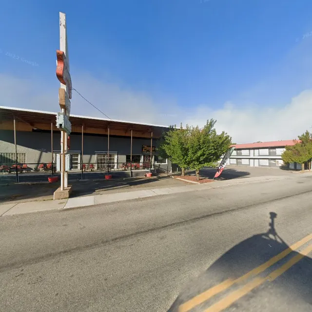 The Old Hotel next to the pizza restaurant "Sunshine Inn"