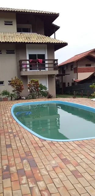 Na praia flat Ingleses