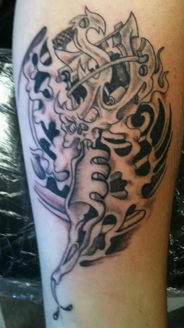 Smokin Guns Tattoo and Body Piercing