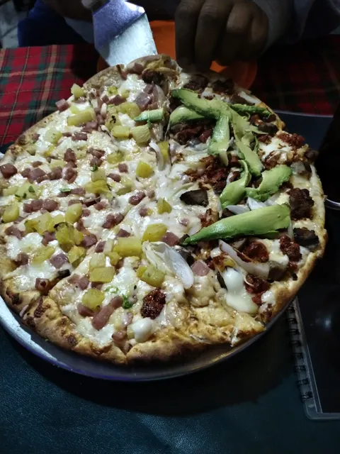 Pizzas y Chelas