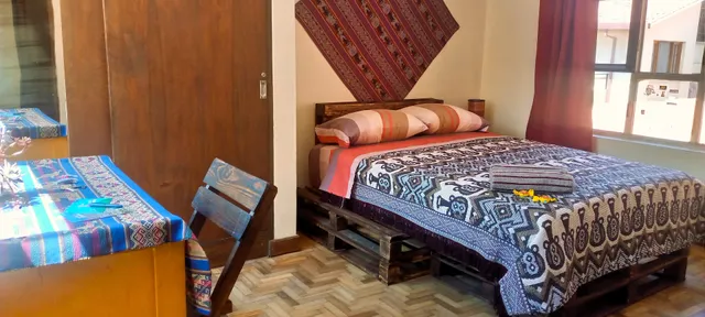 La Otra Casita Feliz / Garaje