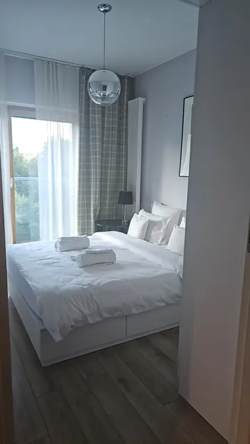 PATRONUS APARTMENTS w budynku Mennica Residence wynajem apartamentów na doby.