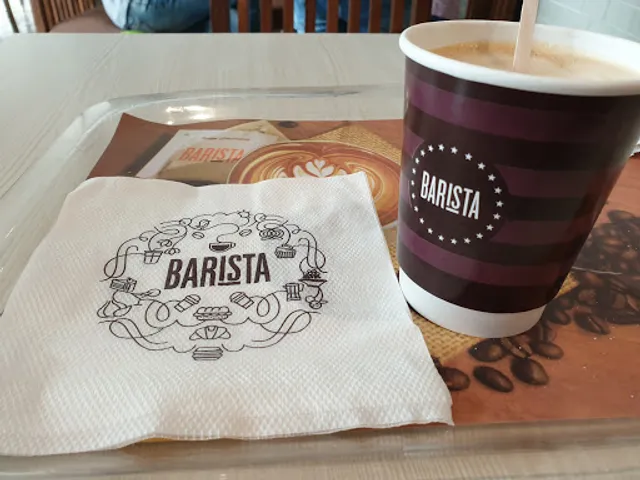 Barista Cafe Urmi axis