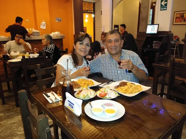 Pollos y Parrillas "Huayas"