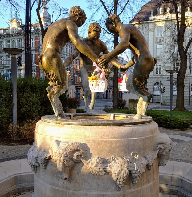 Fountain with three fauns