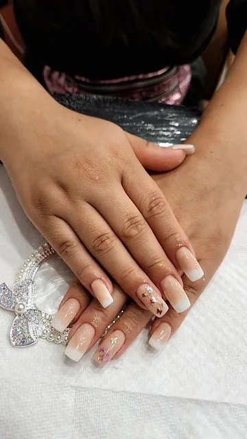 Dazzling Nails and Spa Corporation