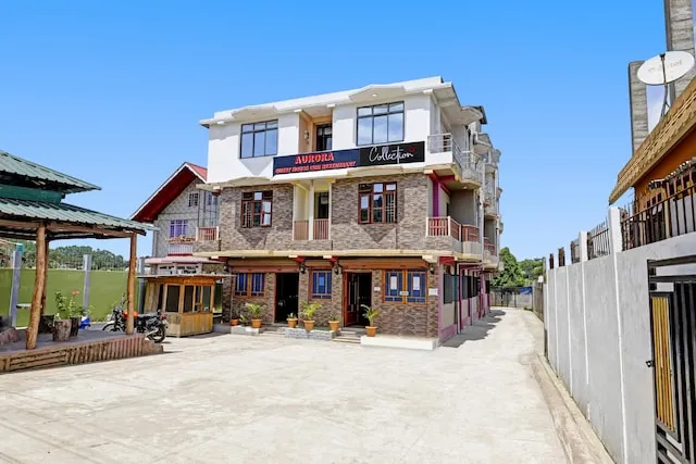 Capital O Aurora Guest House