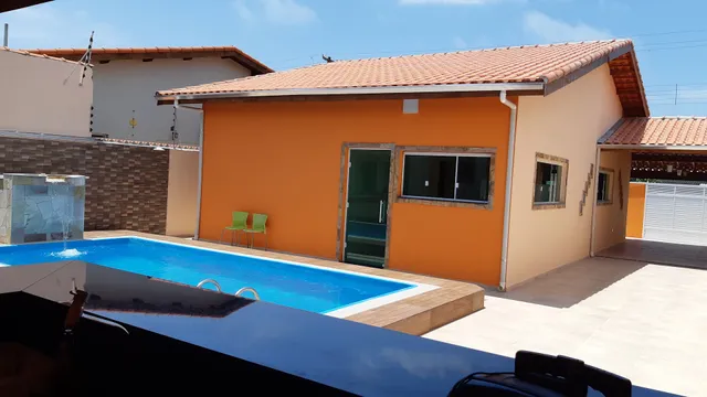 casa na praia com piscina temporada