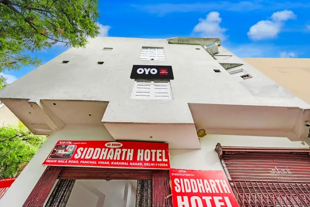 Hotel O Flagship Siddharth Hotel Yamuna Vihar C Block Stand