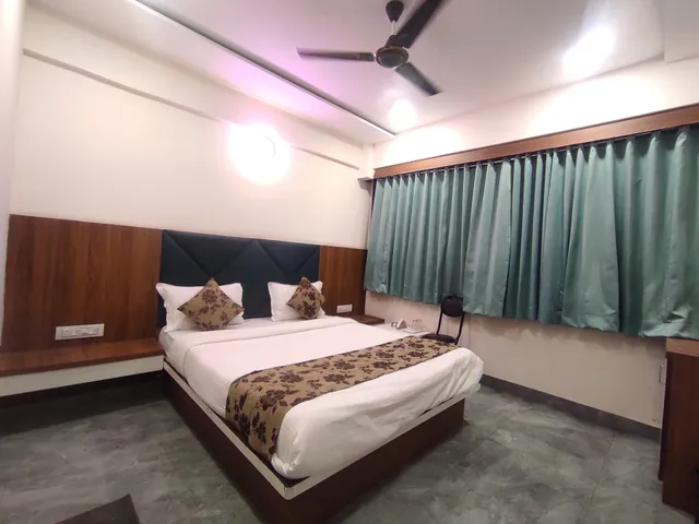HOTEL EARTH INN, Subhash Bridge, RTO Circle, Ahmedabad