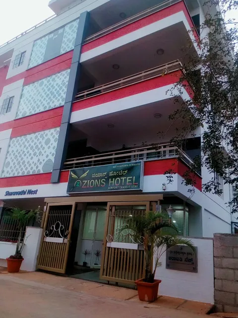 Zions Hotel | Near Bangalore International Airport | Hourly Rooms Available.