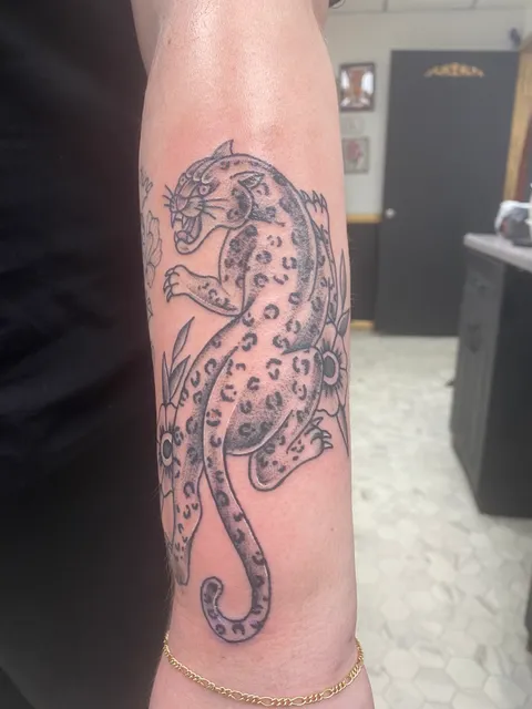 Pins and Roses Tattoo