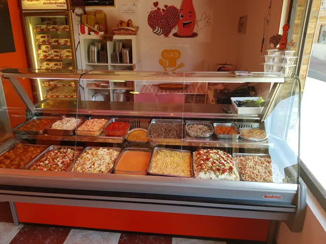 Asador de pollos Con Amor y Pimienta