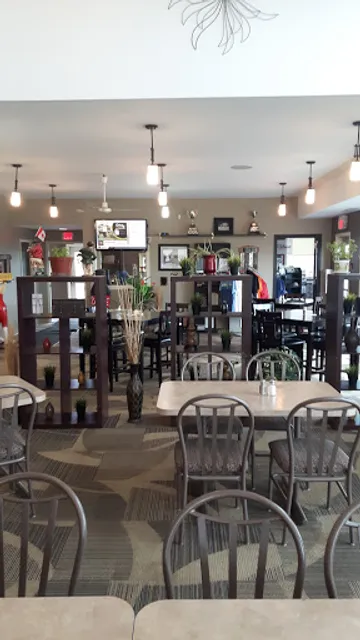 The Tin Cup by Little Greek