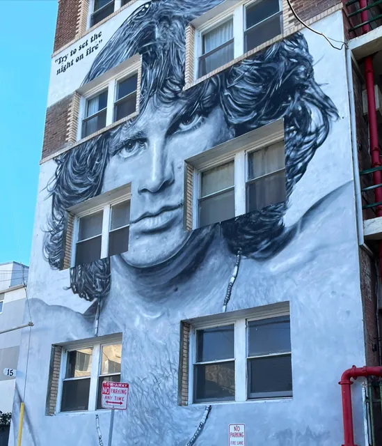 Jim Morrison Mural on the side of the Ellison Suites
