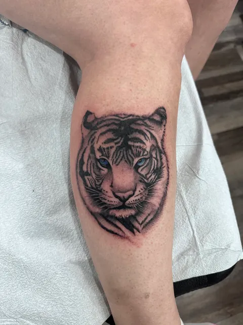 The Marked Sparrow Tattoo