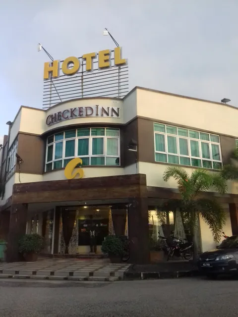 Capital O 90714 • Hotel Checked Inn