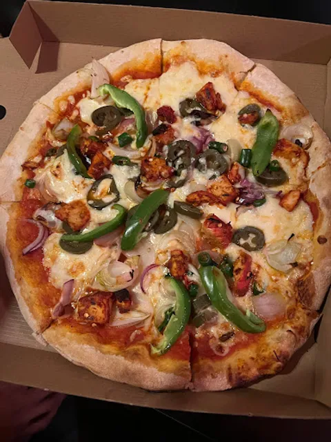 New Delhi Indian Palace & Ricardos Pizza House