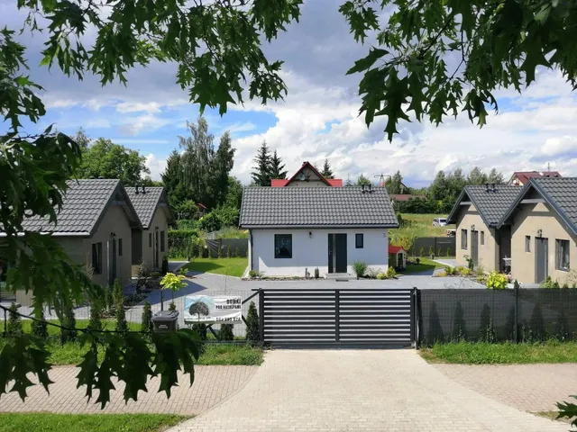 Domki Pod Katalpami — Noclegi Mikołajki