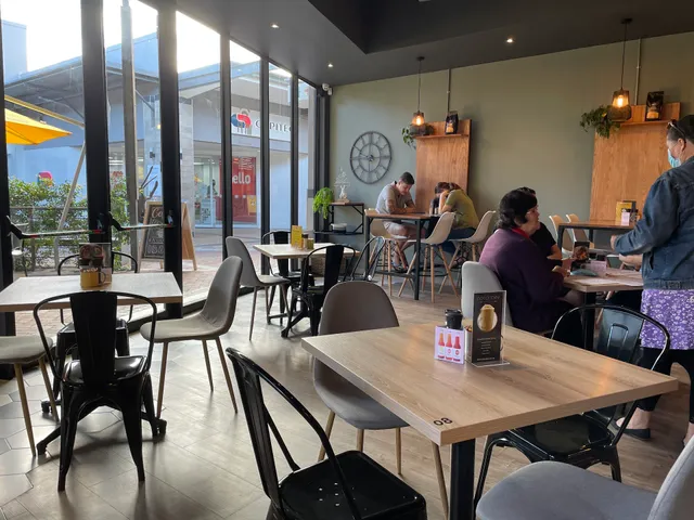 The Daily Coffee Café Burgundy