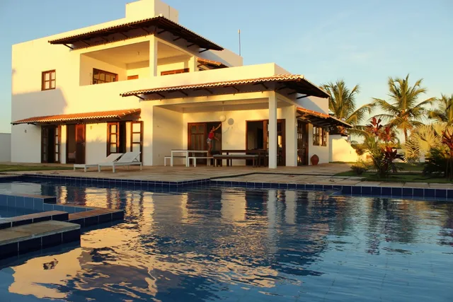 Casa Palma Azul de praia com piscina