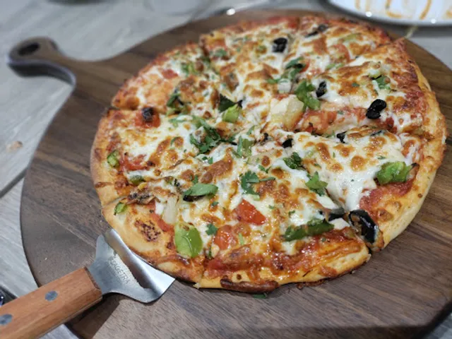 VEG DELIGHT PIZZA BAKERY AND RESTAURANT