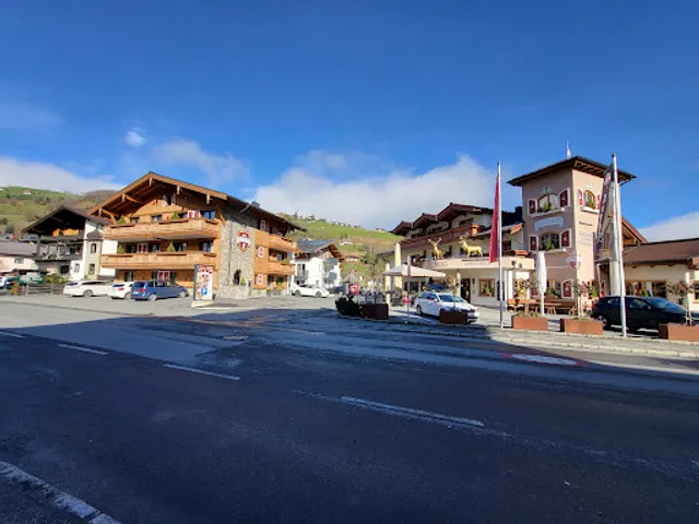 Dorfkrug Kaprun Appartements und Restaurant