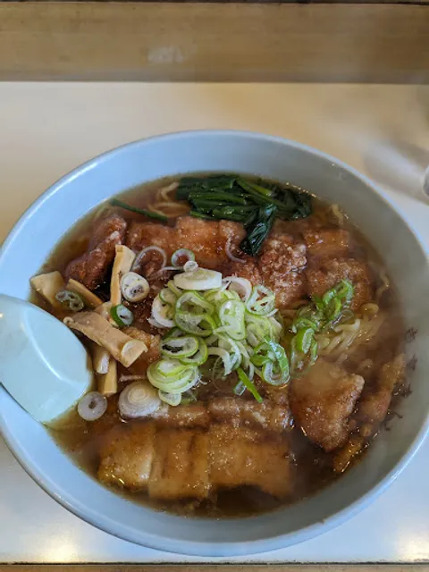 東京まん小山田店