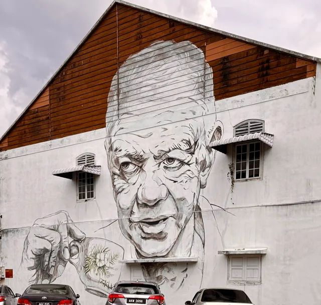 Ipoh Mural - No.1 An Old Uncle Drinking Coffee