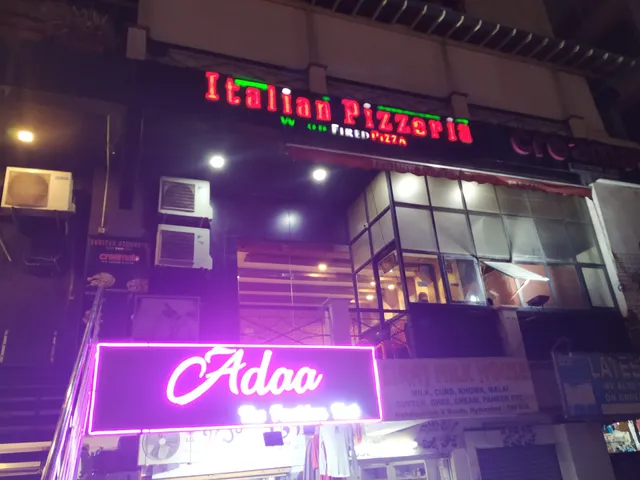 Italian Pizzeria wood fired pizza halal & creamato ice cream cafe