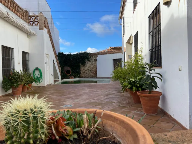 AT Fábrica de Palos: Dúplex con piscina comunitaria en el centro de Cazalla de la Sierra