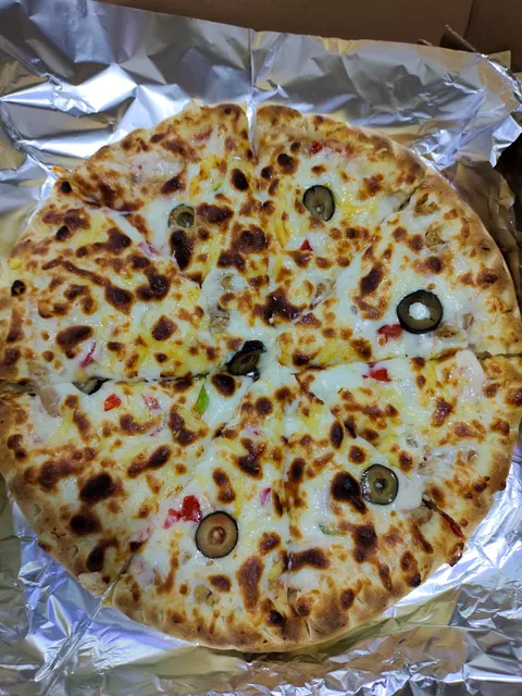 فطائر وبيتزا الإسكندراني