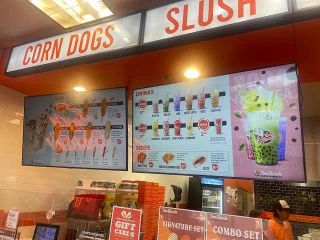 two hands corn dog Irvington