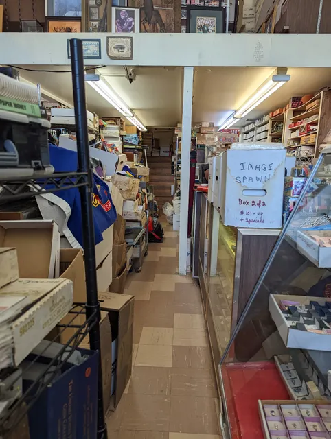 Tom's Coin Stamp Gem Baseball & Comic Shop