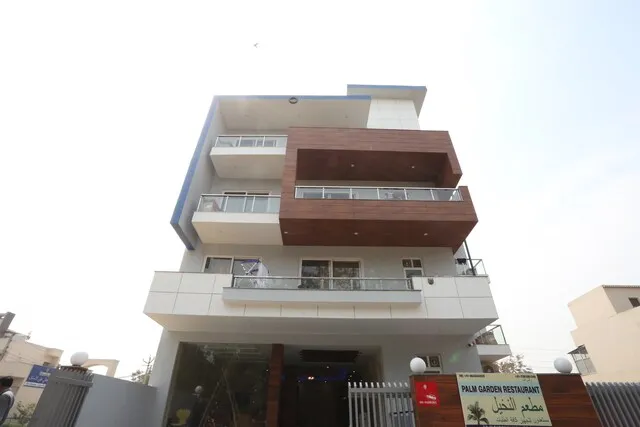 OYO Flagship 12081 Palm Garden Suites