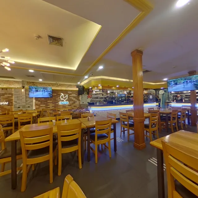 TASCA POLLERA EL ZAMBO GRILL C A