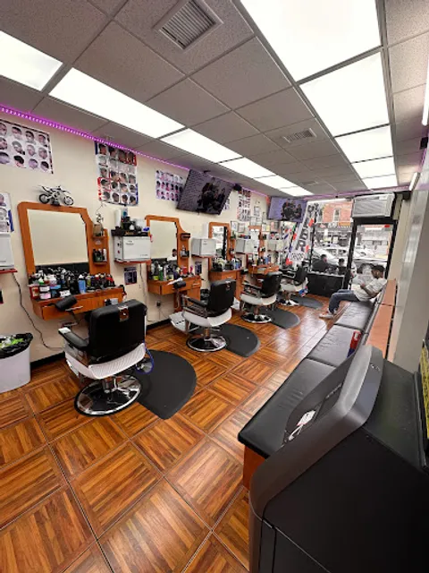 Los Cuńaos Barbershop